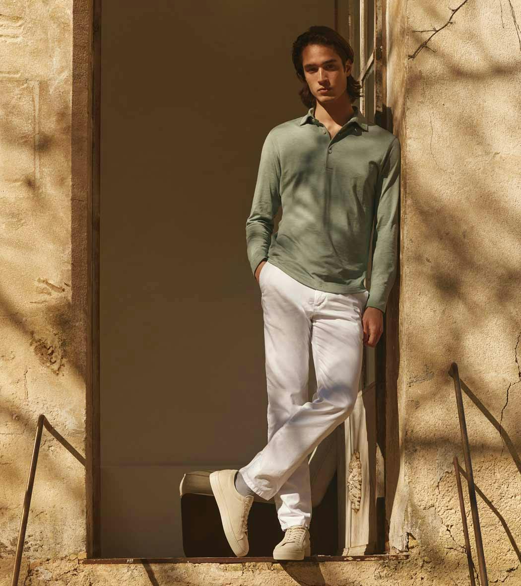 Luca Faloni model wearing silk cotton polo Amalfi in marine green