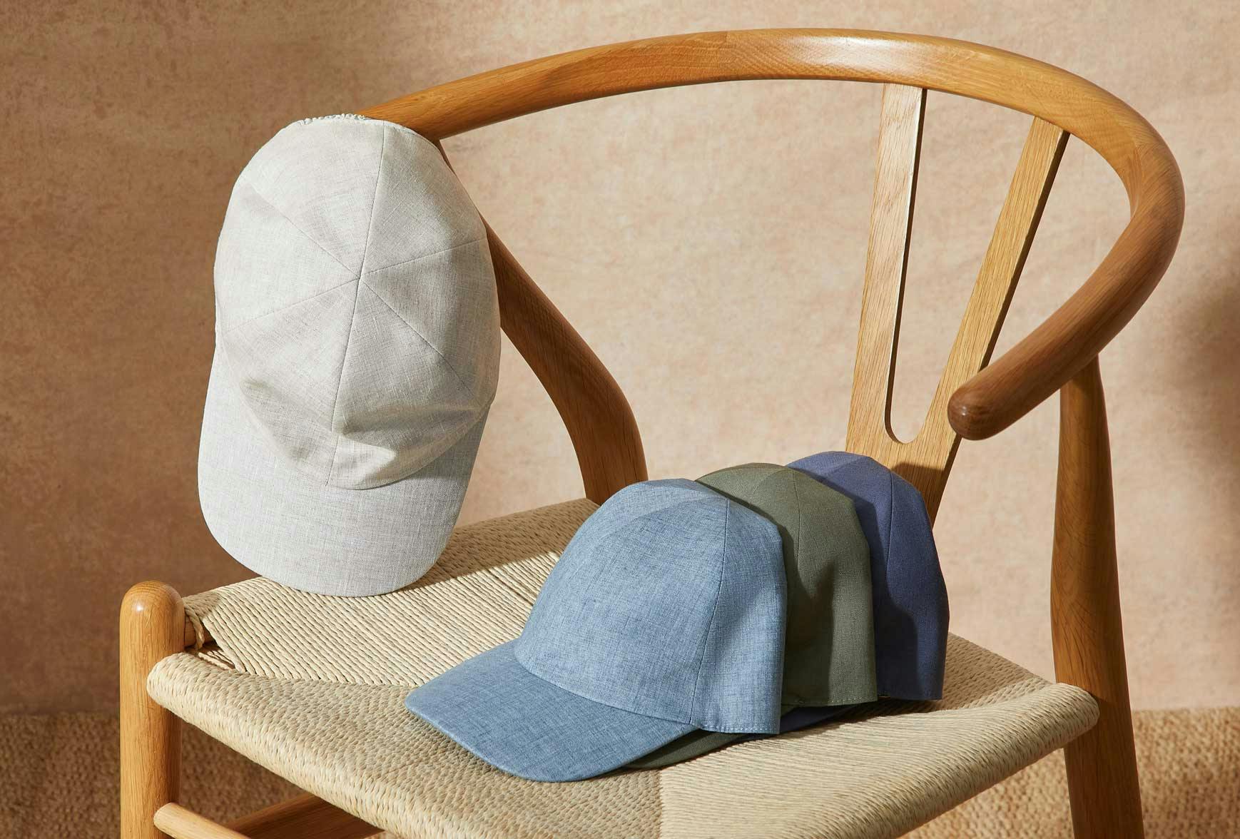 Linen caps, in different colors, on a chair