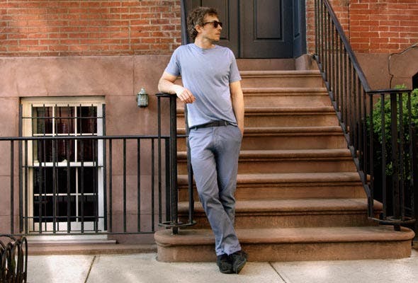Chef Adam Kenworthy wearing Luca Faloni silk cotton t-shirt in light blue and lightweight cotton chinos in steel blue