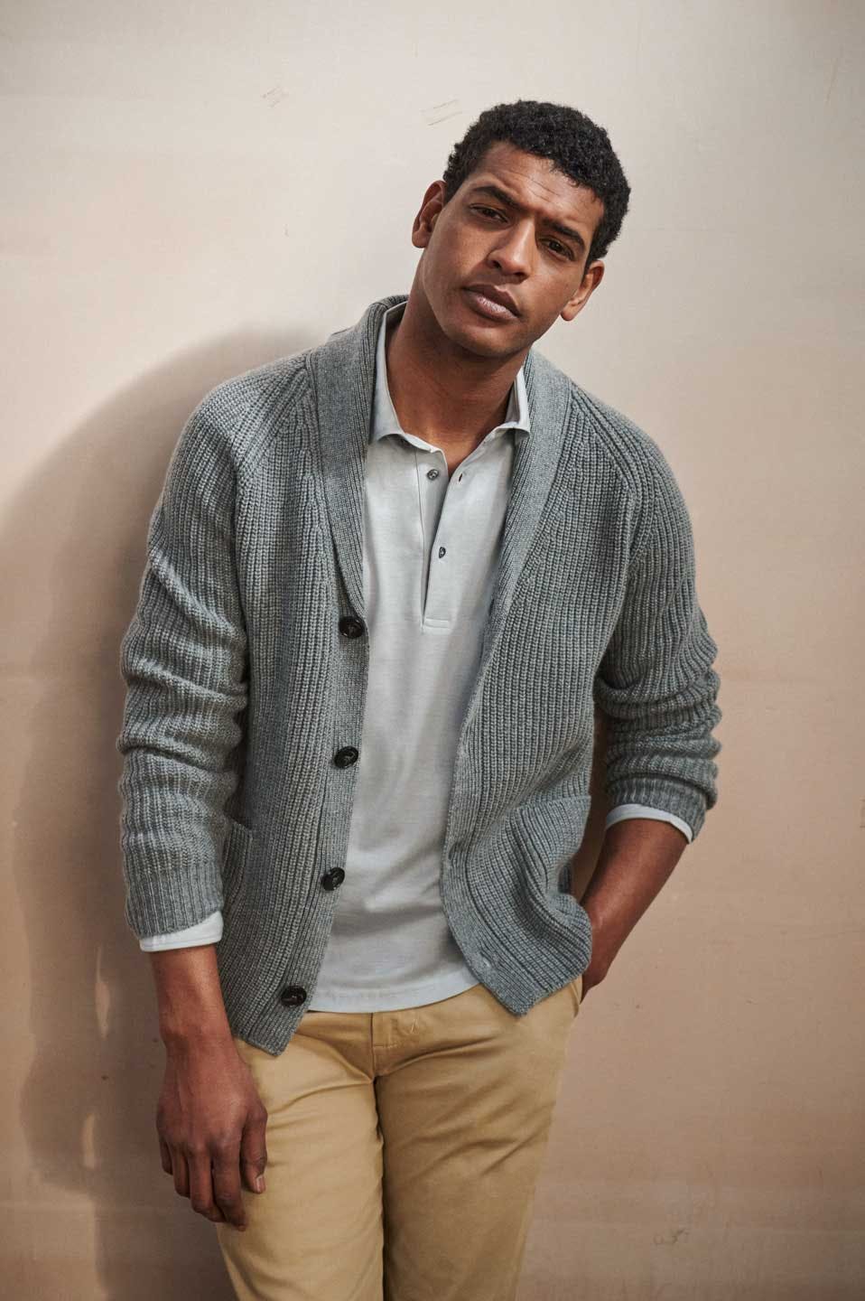 Luca Faloni Model Wearing Chunky Knit Cashmere Cardigan and Silk-Cotton Polo Shirt with Lightweight Cotton Chinos