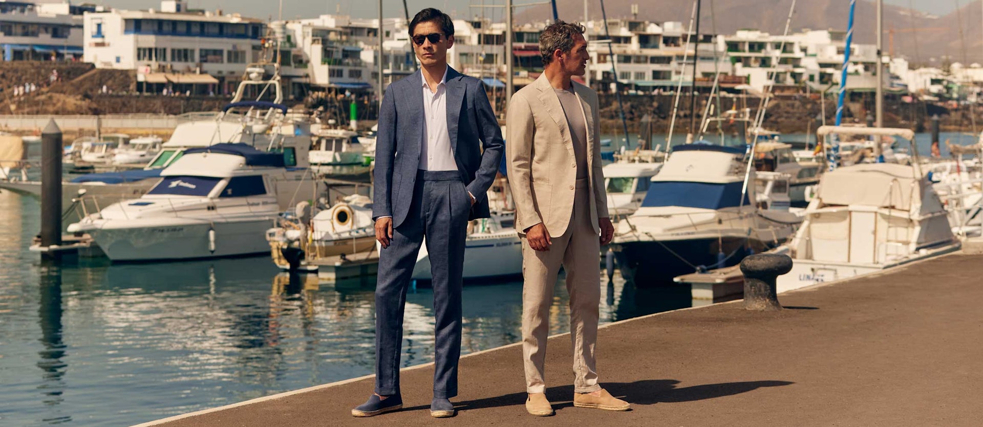 Luca Faloni Models Wearing Navy Blue and Sand Linen Suit